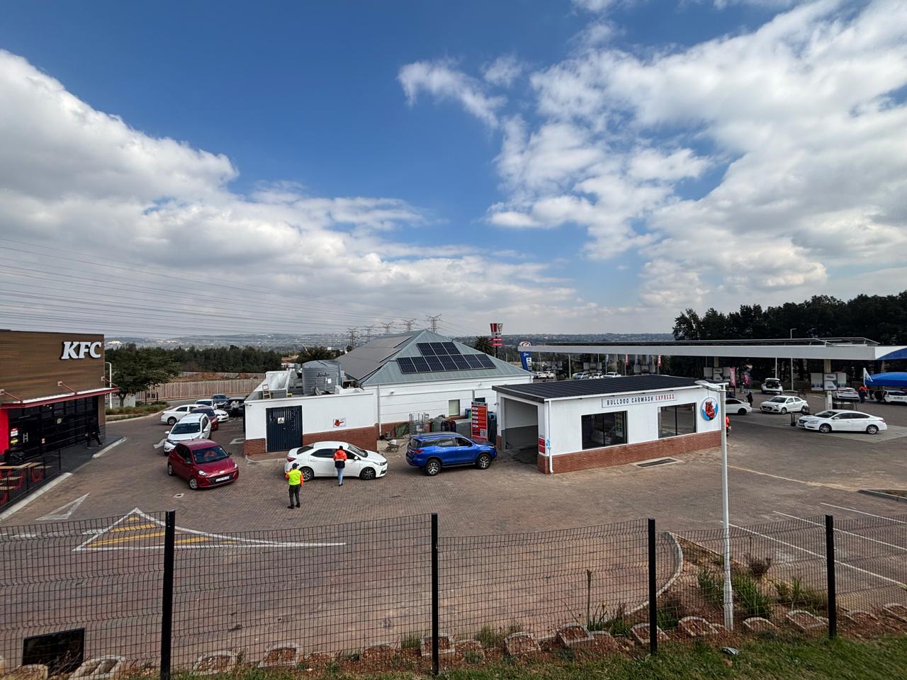 Bulldog Carwash Express partner site forecourt with cars queuing